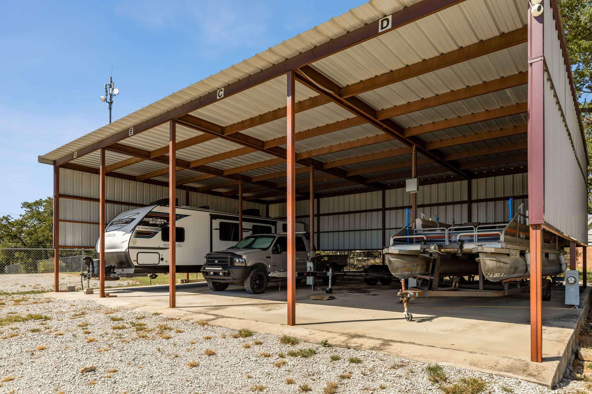Coverd RV camper and boat parking in Azle, TX